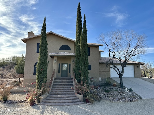 view of front of home with a garage