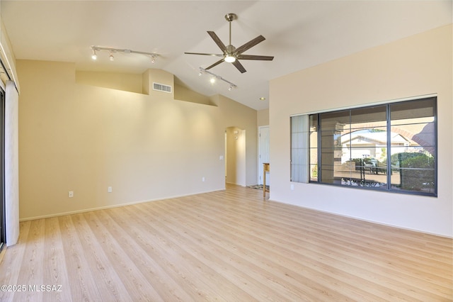 unfurnished living room featuring high vaulted ceiling, track lighting, light hardwood / wood-style floors, and ceiling fan