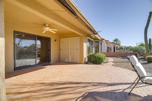 view of patio with ceiling fan