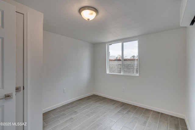 unfurnished room with light hardwood / wood-style flooring