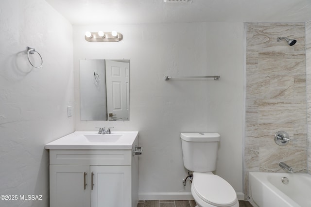 full bathroom with vanity, toilet, and tiled shower / bath combo