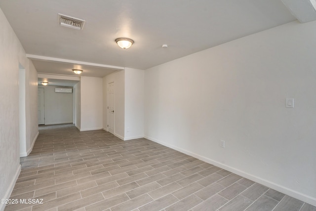 spare room with light hardwood / wood-style flooring