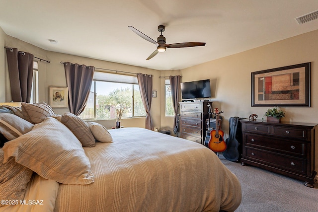 carpeted bedroom with ceiling fan