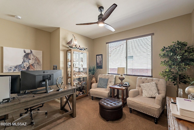 carpeted office space with ceiling fan