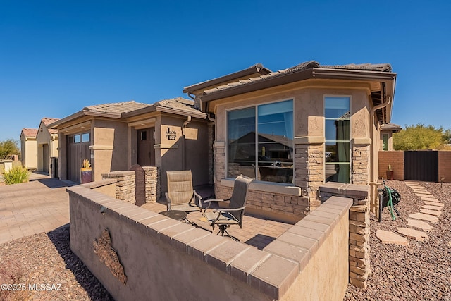 exterior space with a patio area