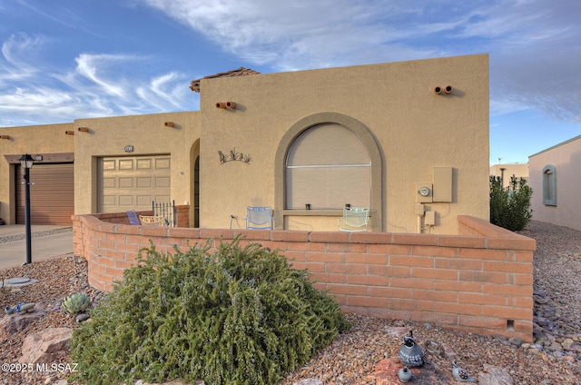 exterior space with a garage