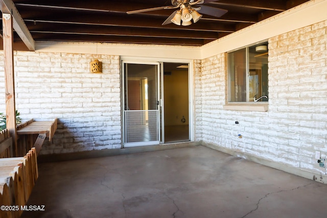 view of patio featuring ceiling fan