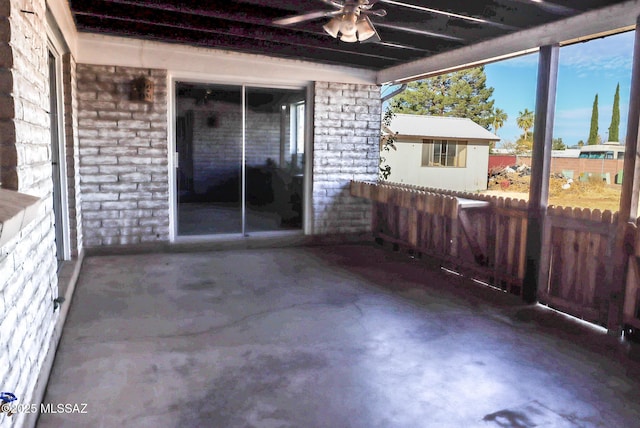 view of patio featuring ceiling fan