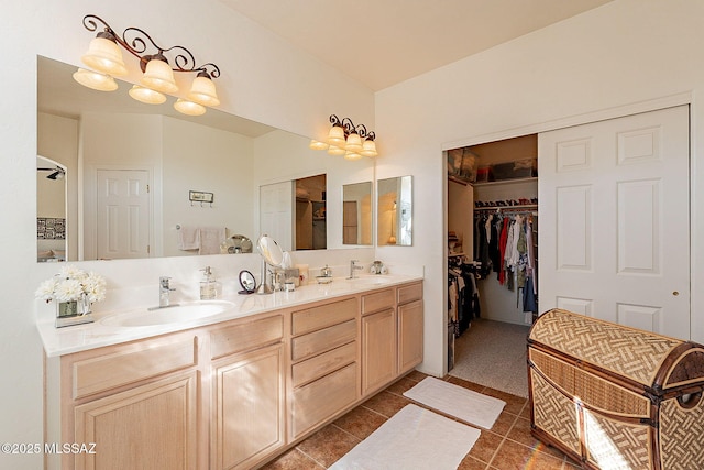 bathroom featuring tile patterned floors and vanity