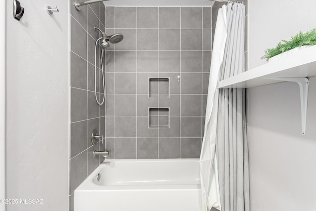 bathroom featuring shower / bathtub combination with curtain