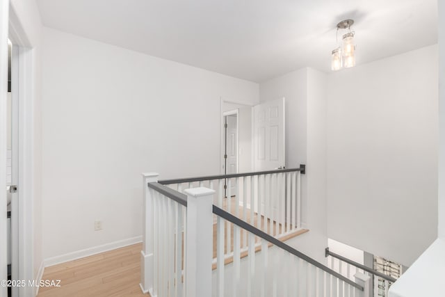 hallway with light wood-type flooring