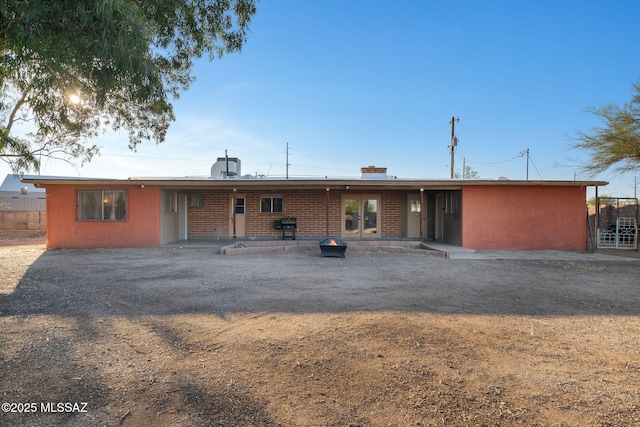 view of front facade with a patio area