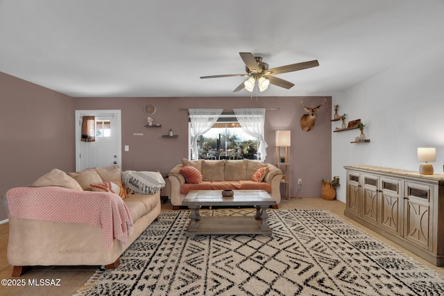 living room with ceiling fan