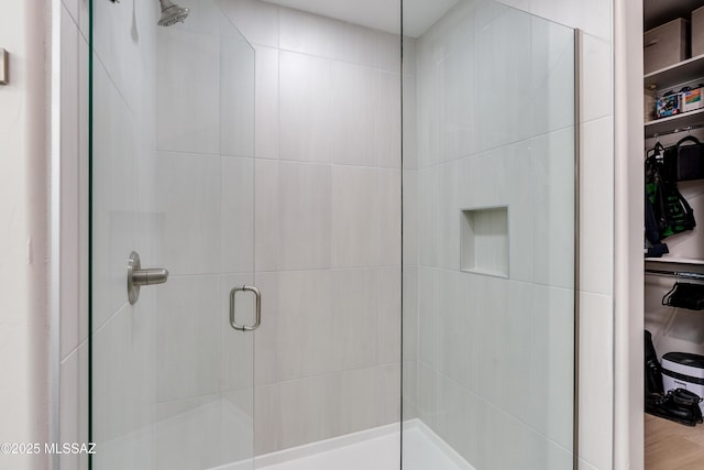 bathroom featuring an enclosed shower