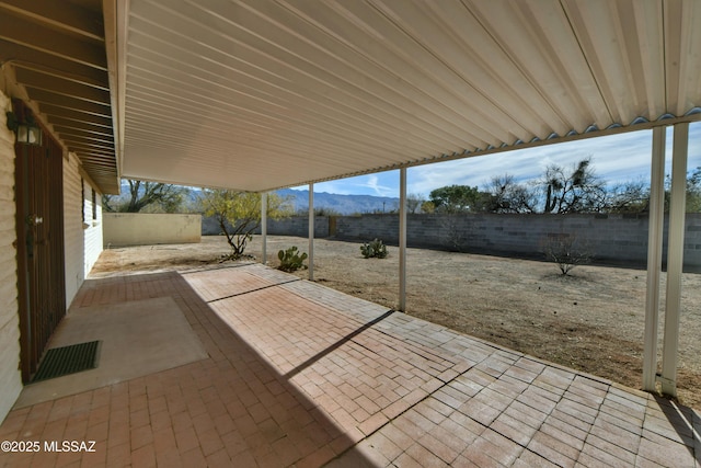 view of patio with a mountain view