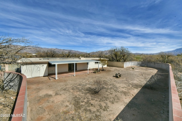 exterior space featuring a mountain view