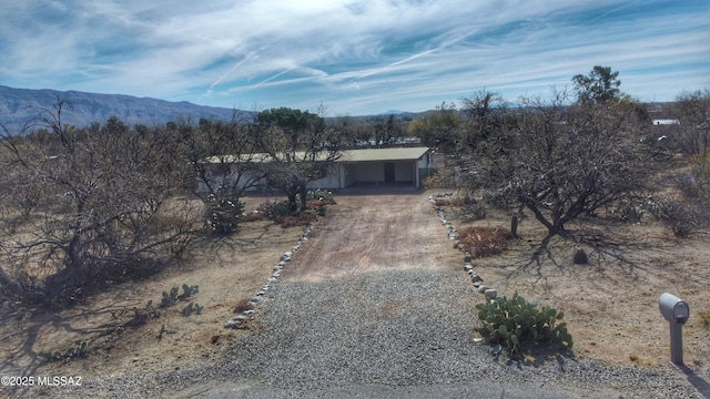 view of front facade featuring a mountain view