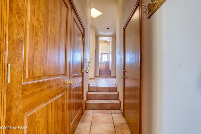 hallway with light tile patterned flooring