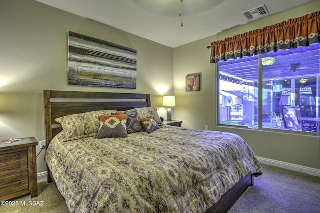 carpeted bedroom with ceiling fan