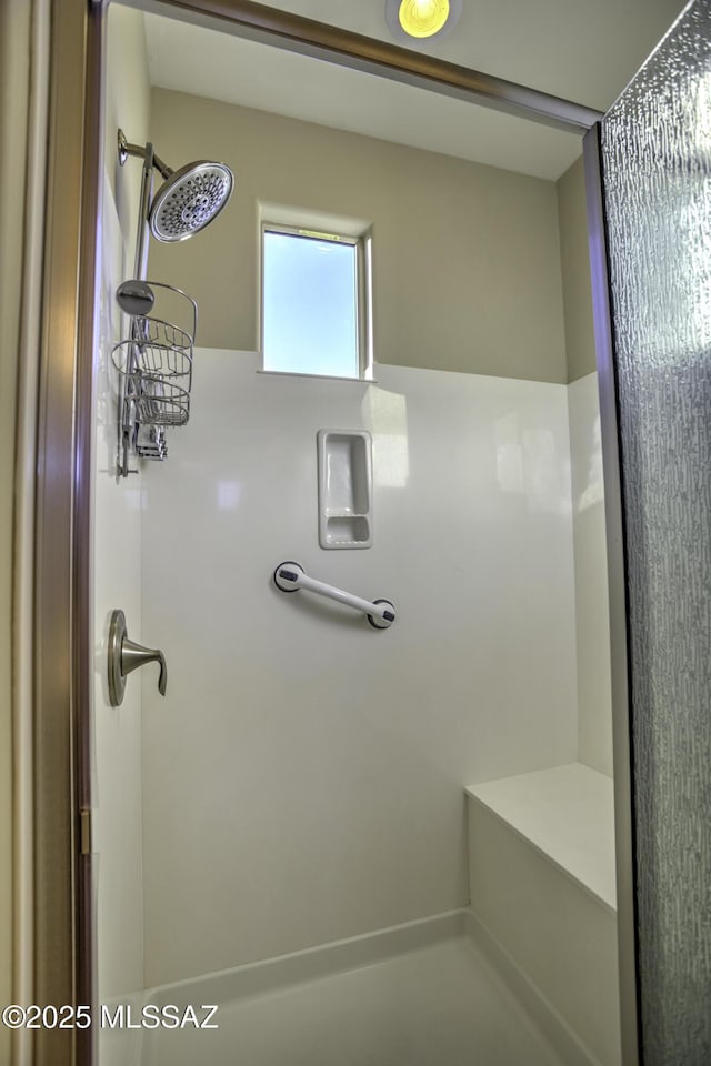 bathroom featuring a shower