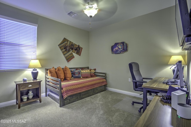 carpeted bedroom featuring ceiling fan