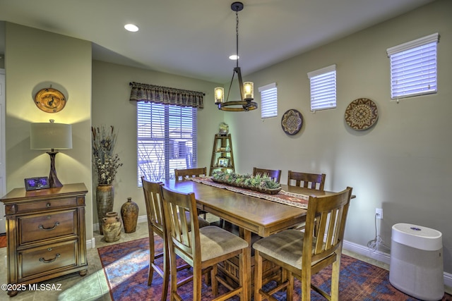 dining room featuring an inviting chandelier