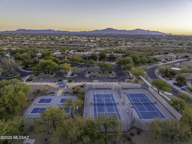 aerial view at dusk with a mountain view