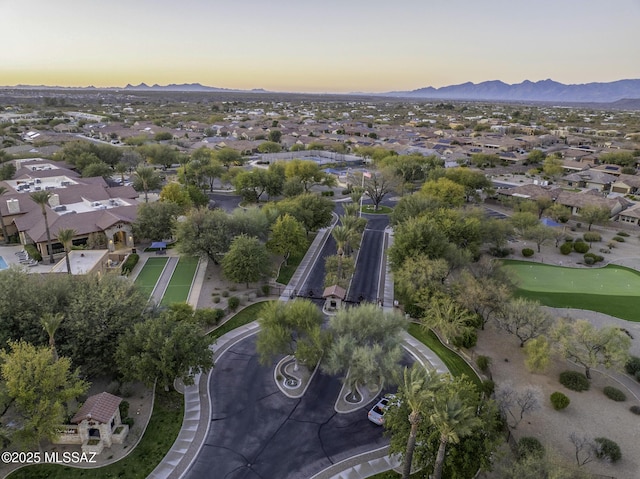 aerial view at dusk with a mountain view