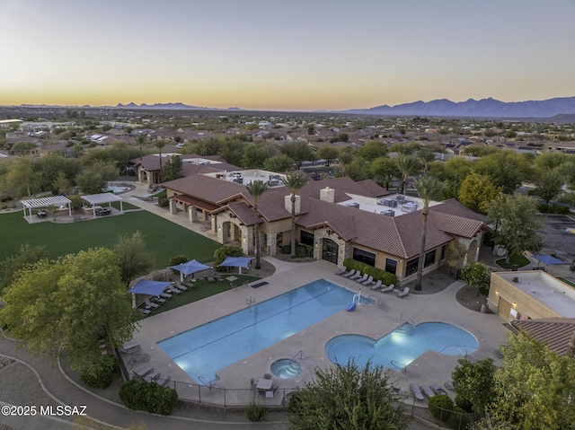 10221 S Rose Wagon Way, Vail, AZ 85641 - aerial view at dusk with a mountain view