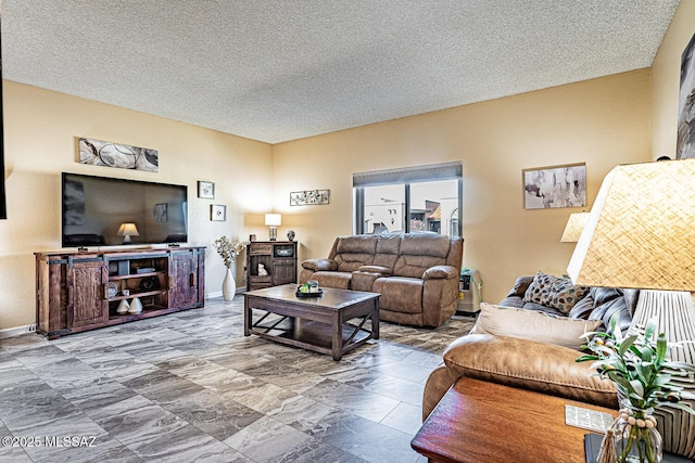 living room featuring a textured ceiling