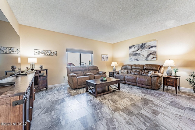 living room with a textured ceiling