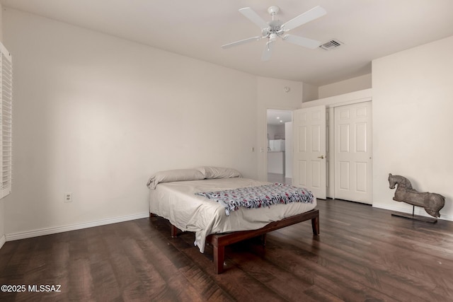 bedroom featuring dark wood-type flooring and ceiling fan