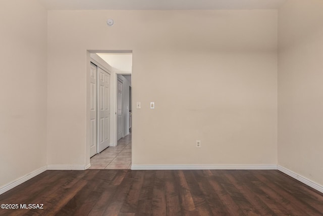 empty room featuring hardwood / wood-style flooring