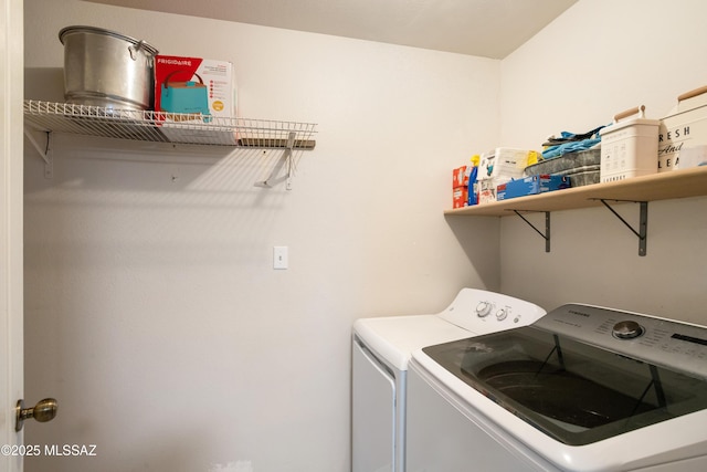 laundry room with separate washer and dryer