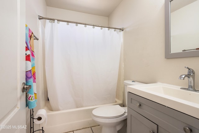 full bathroom featuring tile patterned floors, vanity, toilet, and shower / tub combo