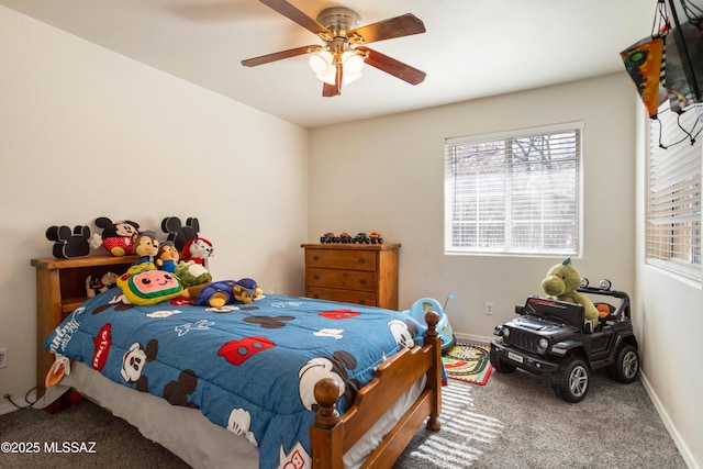 bedroom with ceiling fan and carpet flooring