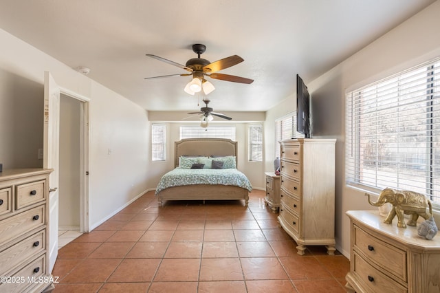 bedroom featuring light tile patterned floors and ceiling fan