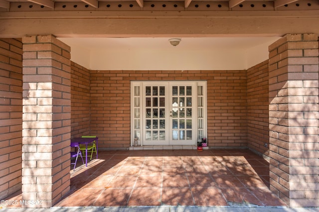 doorway to property featuring french doors and a patio area