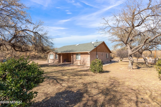 rear view of house featuring a patio area