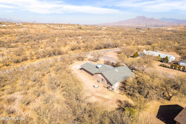 birds eye view of property featuring a mountain view