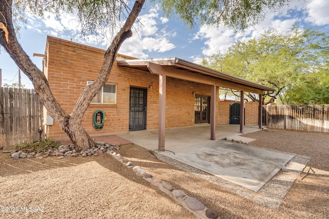 back of house featuring a patio area