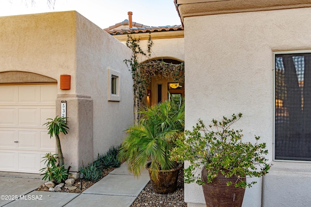 entrance to property with a garage