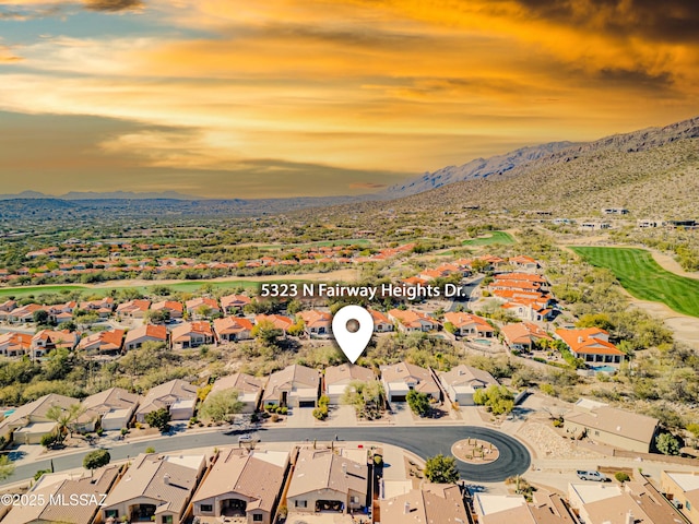 aerial view at dusk with a mountain view