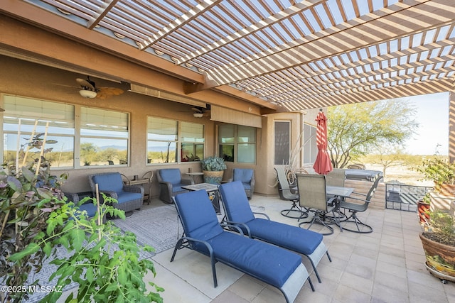 view of patio / terrace featuring a pergola, outdoor lounge area, and ceiling fan