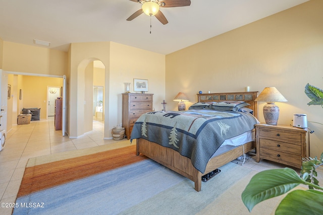 bedroom featuring ceiling fan and light tile patterned floors