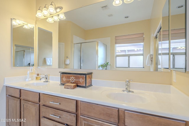 bathroom featuring vanity and walk in shower