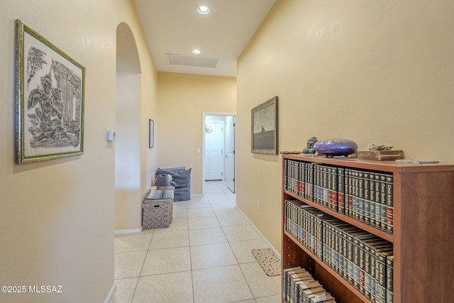 corridor featuring light tile patterned flooring