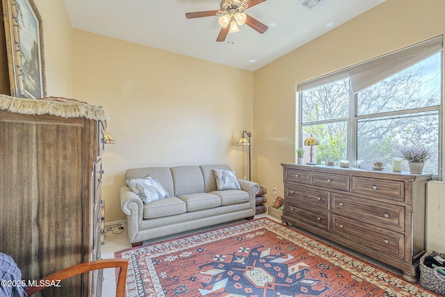 living room featuring ceiling fan