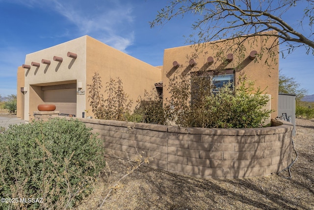 view of home's exterior featuring a garage