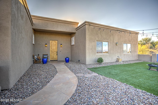 exterior space featuring a yard and a patio area